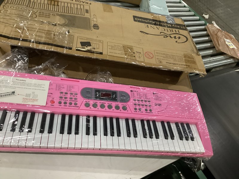 Condition photo showing New/Like New for Hricane Keyboard Piano Lighted Keys for Beginner Adults Teens Kids, 61 Key Electronic Music Keyboard with Teaching Modes Powered by USB or Battery with LCD Display Microphone Headphone Jack Lighted Keys-Pink