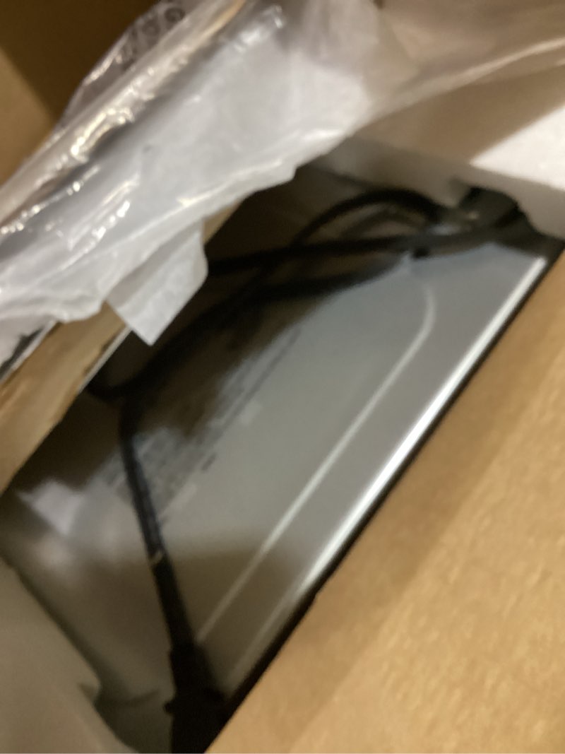 Condition photo showing Good Condition for hamilton beach easy reach 4-slice countertop toaster oven with roll-top door, 1200 watts, fits 9” pizza, 3 cooking functions for bake, broil and toast, silver (31344da) silver 4-slice
