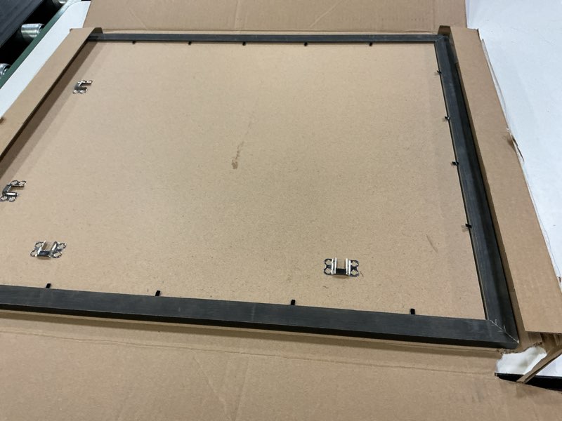 Condition photo showing Good Condition for mcs studio gallery classic 18x24 poster frame natural woodgrain engineered wood, vertical & horizontal wall hanging large picture frame for photos, posters & art prints (1-pack) 18x24 natural woodgrain