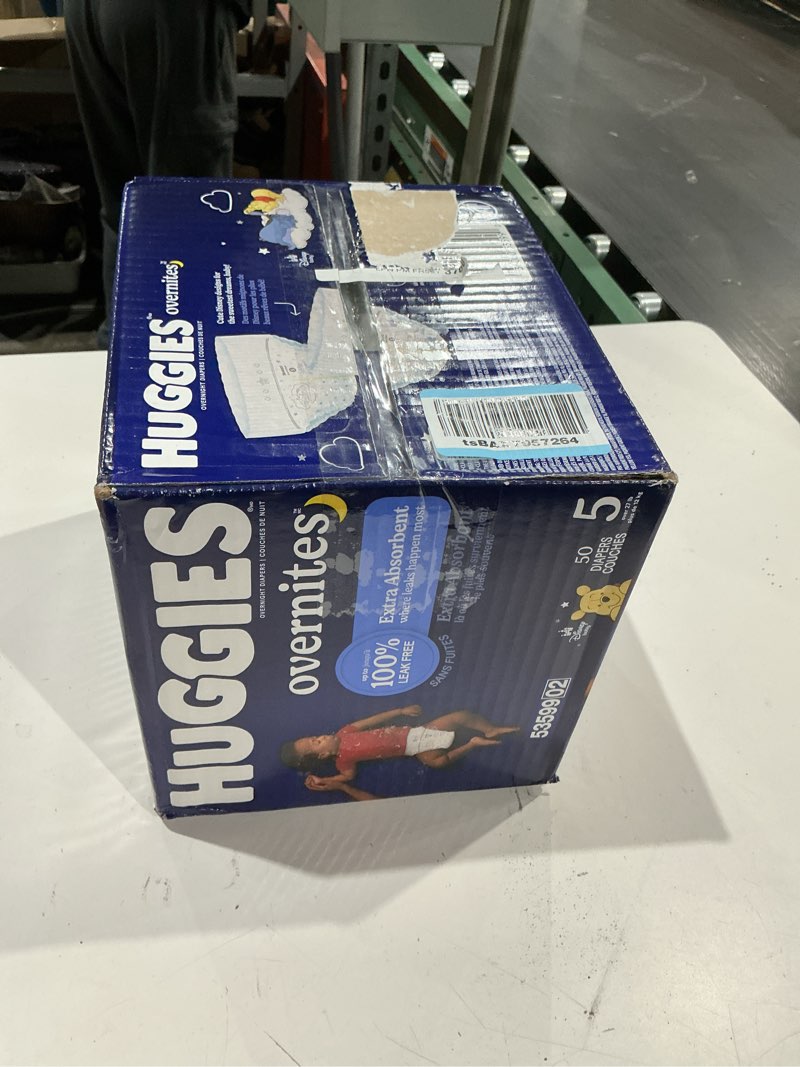 Condition photo showing Good Condition for huggies overnites size 5 overnight diapers (27+ lbs), 50 ct, packaging may vary size 5 50