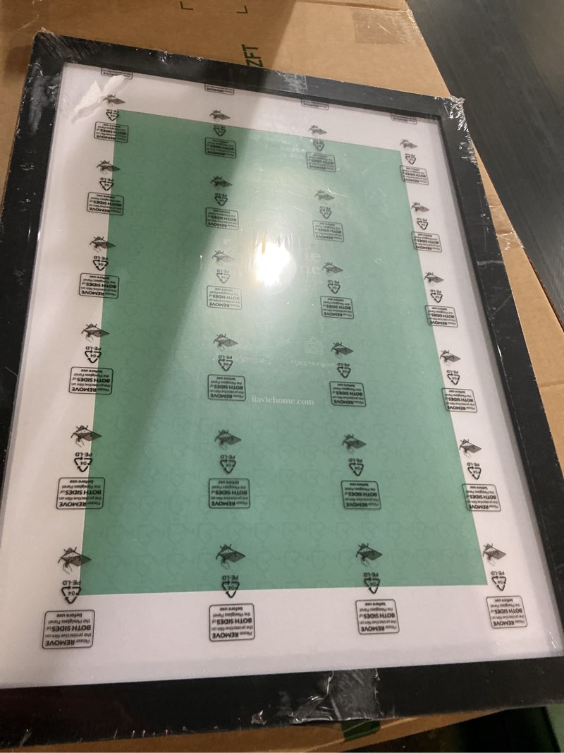 Condition photo showing New/Like New for lavie home 16 x 22 picture frame black poster frame,display pictures 12x18 with mat or 16x22 without mat, stable and sturdy frame and polished plexiglass, horizontal and vertical format of the walls 16x22 black