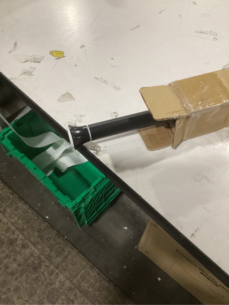 Condition photo showing Good Condition for Amazon Basics Adjustable Sturdy Spring Tension Curtain Rod, No Drilling/No Holes, 36-54", Black, Classic Finial Black 36-54" Indoor