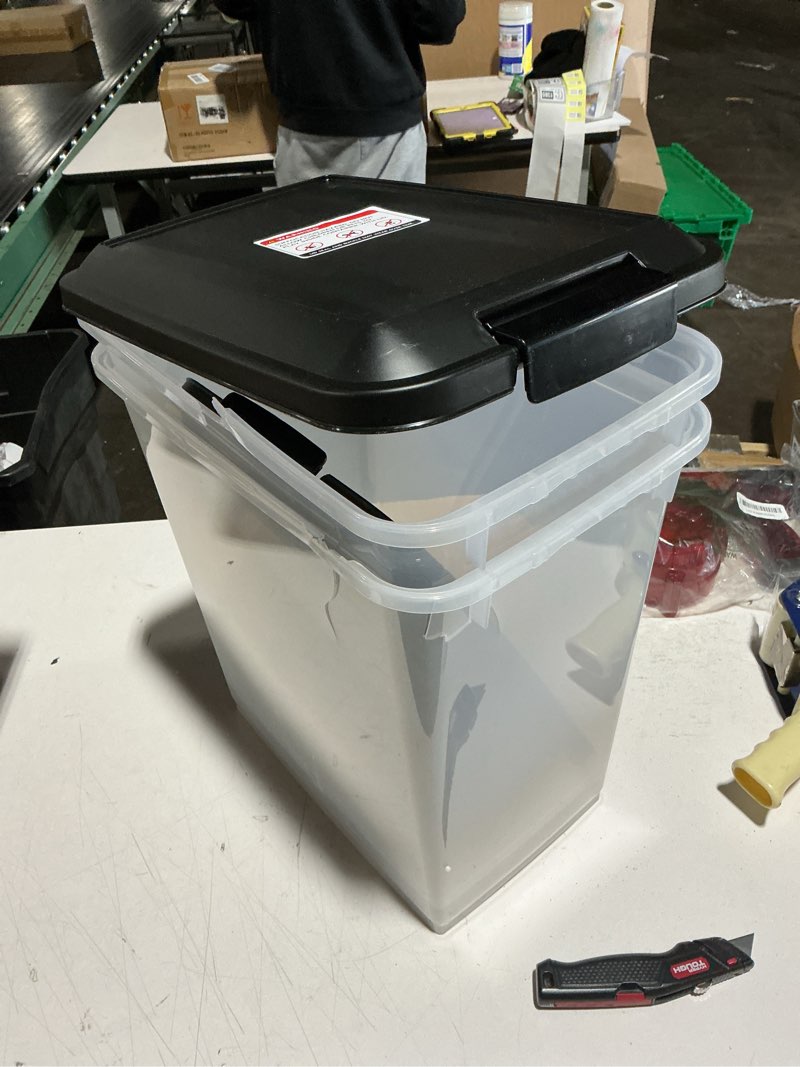 Condition photo showing As Is for IRIS USA Airtight Dog Food Storage Container, Up to 30 lbs / 33 Qt, Attachable Casters, for Dog Cat Bird and other Pet Food Storage Bin, Black