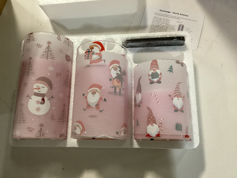 Condition photo showing Good Condition for Eywamage Pink Christmas Flameless Pillar Candle with Remote, Flickering Gnomes Santa Glass LED Candles Battery Operated Set of 3