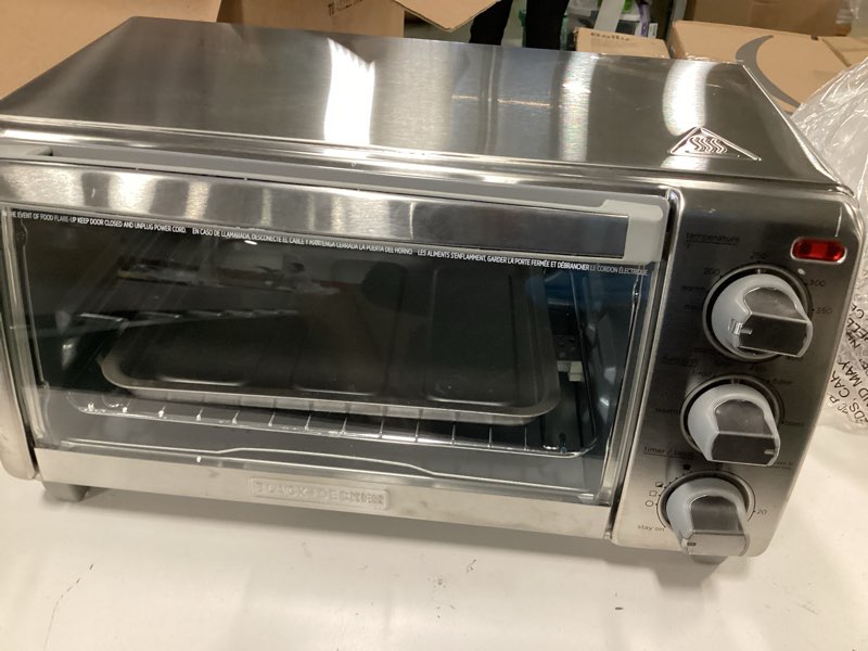 Condition photo showing Good Condition for BLACK+DECKER 4-Slice Toaster Oven, TO1745SSG-1A, Even Toast, 4 Cooking Functions Bake, Broil, Toast and Keep Warm, Removable Crumb Tray, Timer