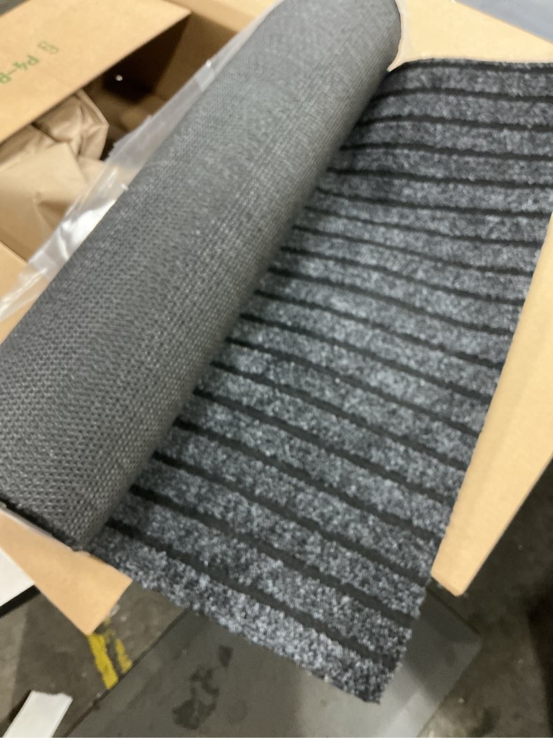 Condition photo showing Good Condition for 2' x 6' runner rugs with rubber backing, indoor outdoor utility carpet runner rugs, stripe gray, can be used as aisle for the rv and boat, laundry room and balcony