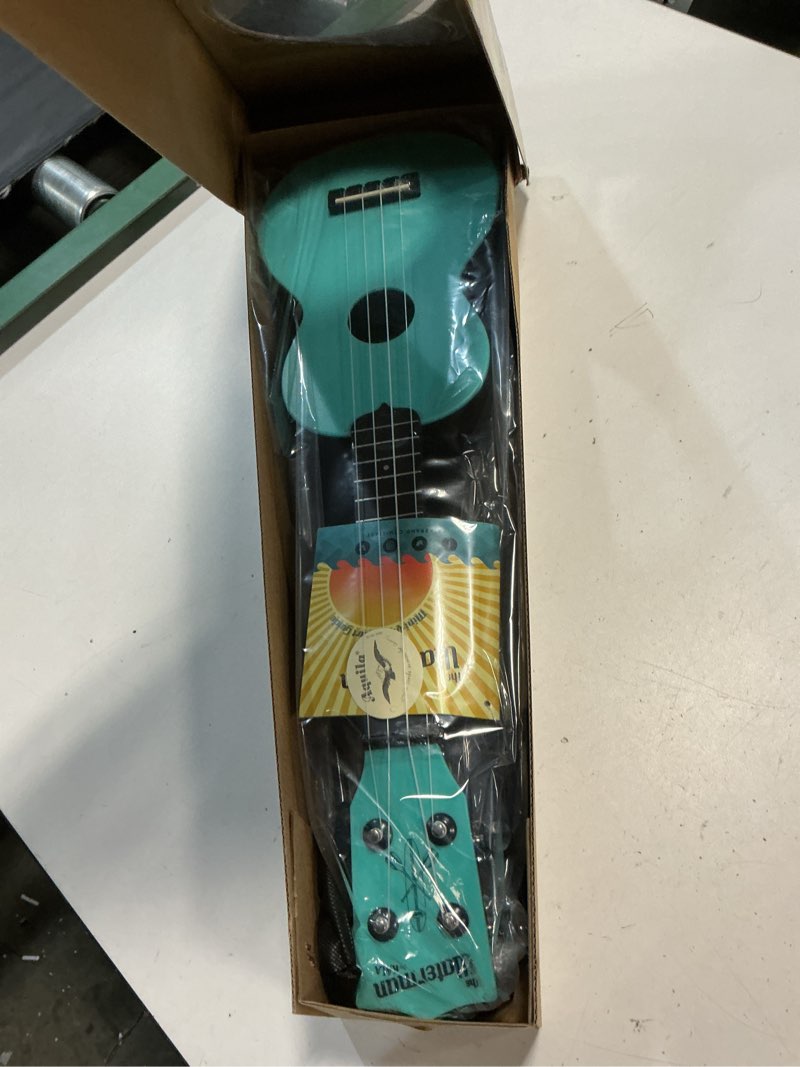 Condition photo showing New/Like New for kala waterman glow-in-the-dark matte soprano ukulele (aqua)