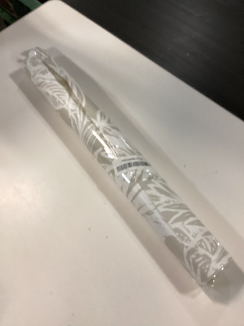 Condition photo showing New/Like New for roommates rmk11435wp beige batik tropical leaf peel and stick wallpaper, roll beige wallpaper