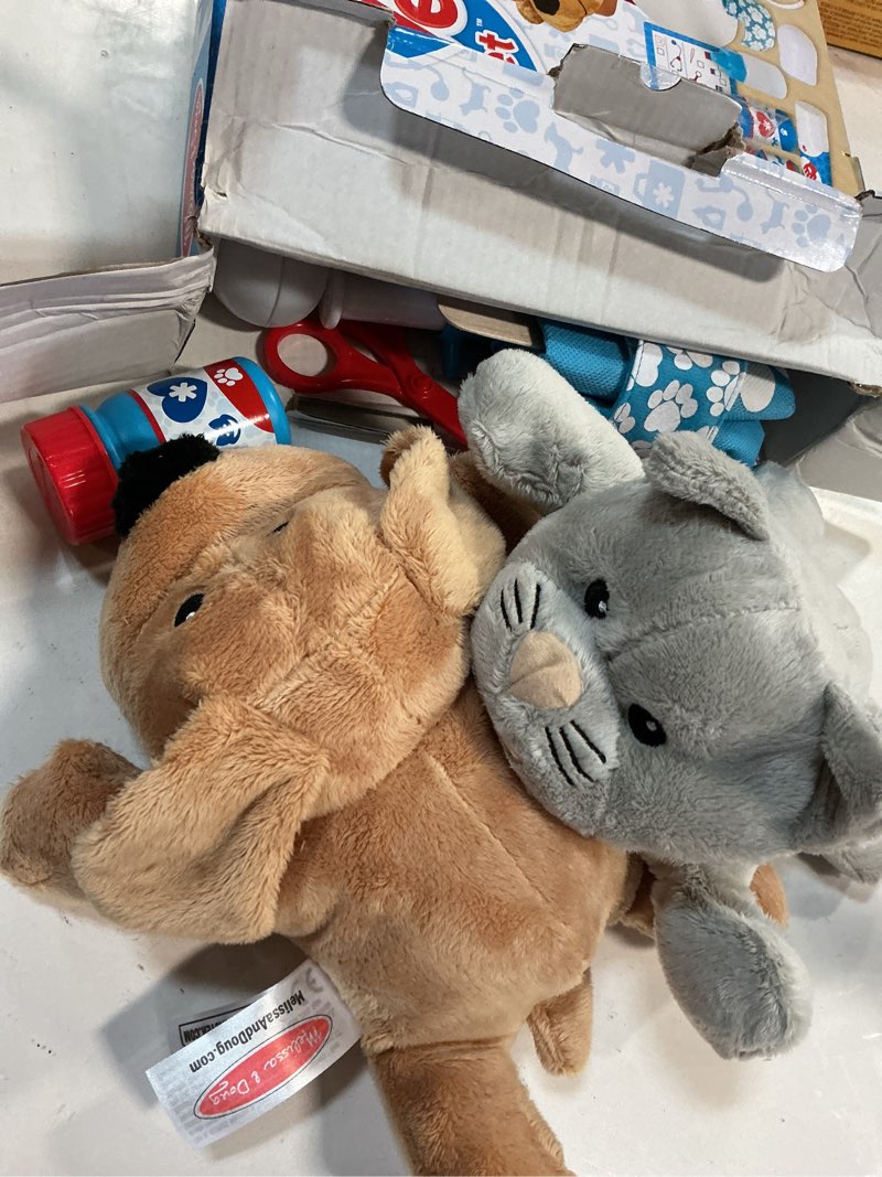 Condition photo showing New/Like New for Melissa & Doug Examine and Treat Pet Vet Pretend Play Set With Plush Dog And Cat (24 Pcs)