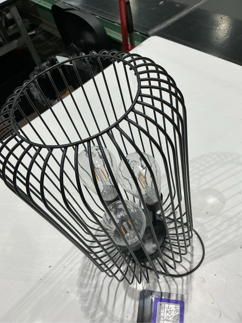 Condition photo showing Good Condition for style selections 8.19-in x 14.76-in black metal solar outdoor decorative lantern
