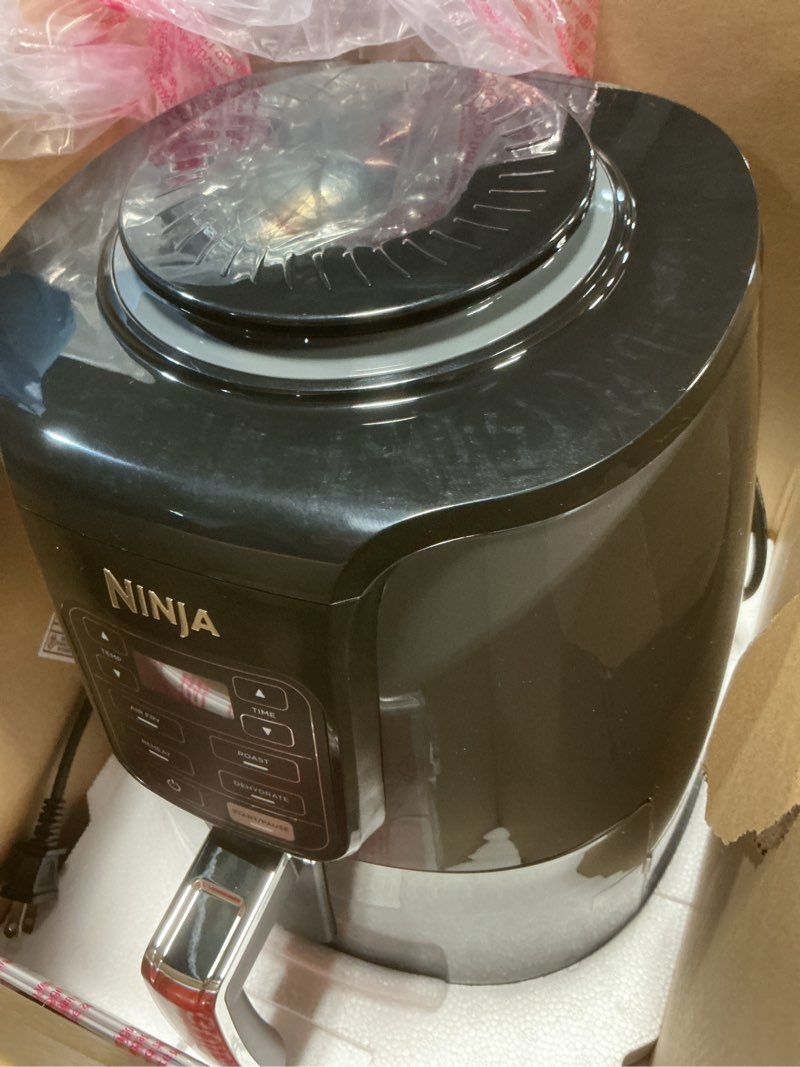 Condition photo showing Good Condition for ninja air fryer | 4 qt capacity | 4-in-1 roast, crisp, roast, reheats, & dehydrates | dishwasher safe parts | 105°f-400°f | includes 20 easy & healthy recipes | 1550 watt | grey | af101