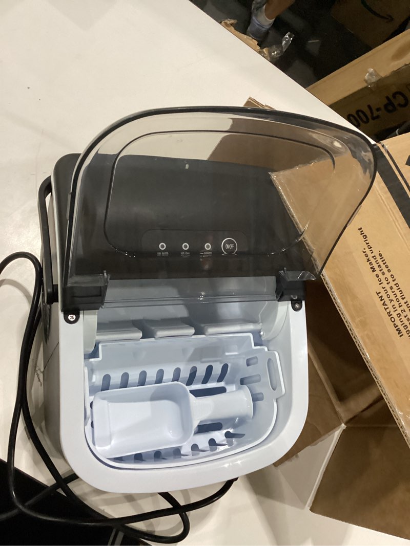 Condition photo showing Good Condition for USED Ice Maker Countertop, Efficient Easy Carry Ice Machine, Self-Cleaning Ice Maker with Ice Scoop & Basket, 9pcs/ 6mins 26.6Lbs Per Day for Home/Office/Kitchen,Black BLACK 26LBS/DAY