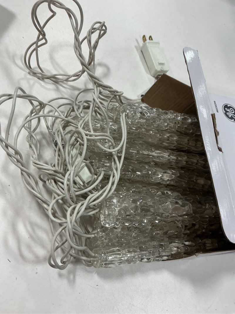 Condition photo showing As Is for GE StayBright 13 -Count Sparkling White LED Plug-In