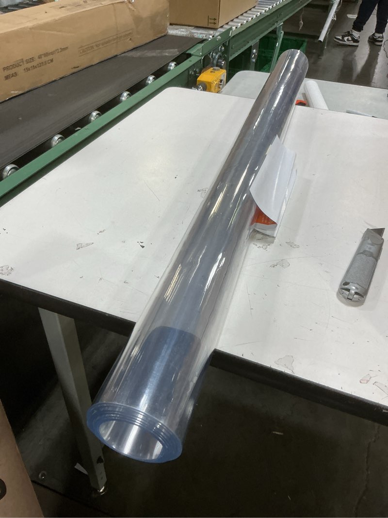 Condition photo showing item condition for Warmstar Clear Table Protector 2mm Thick, 42 x 60 Inch Clear Table Cover Protector, Plastic Table Cover, Clear Desk Mat Desk Pad, Desk Protector Mat for Coffee Table, Writing Desk, Dining Room 60" x 42"