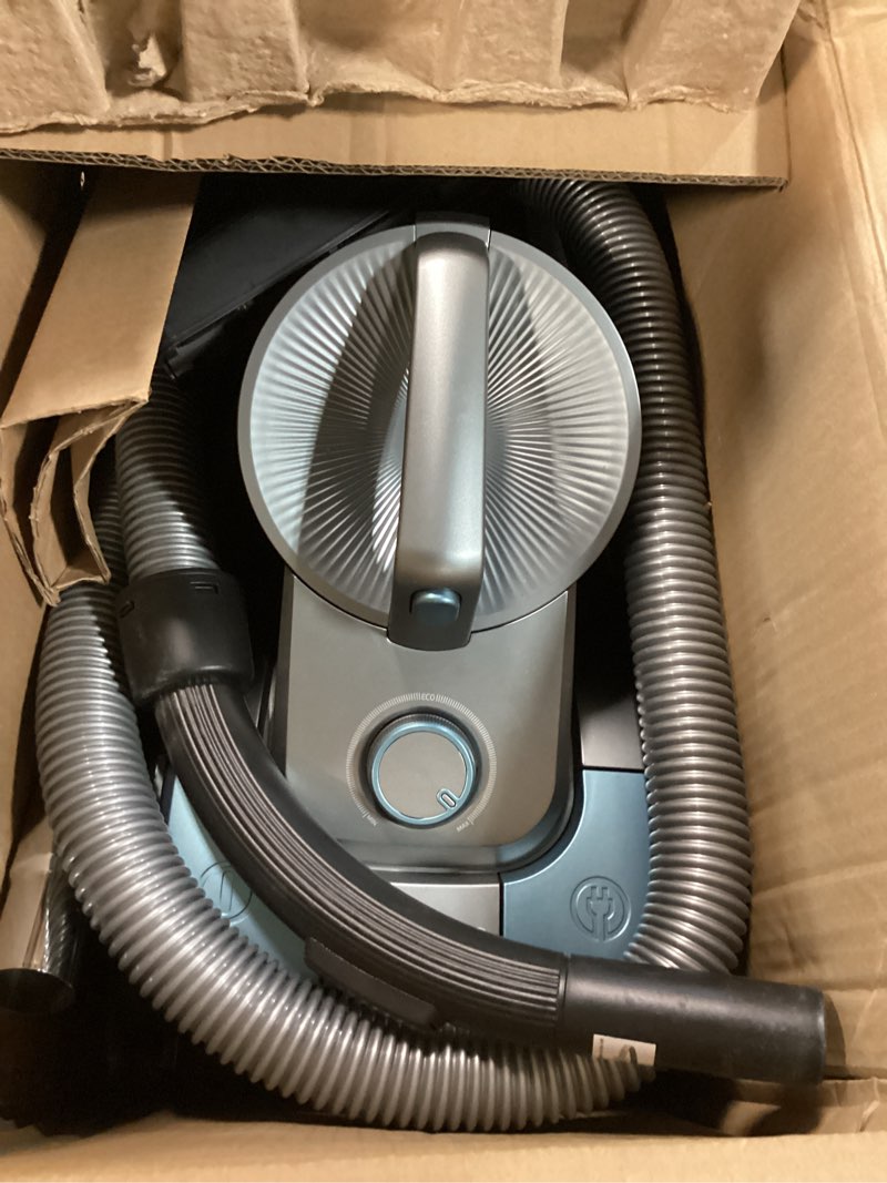 Condition photo showing Good Condition for 1700w canister vacuum cleaner, 45kpa bagless vacuum cleaner, multi-cyclonic filtration, 2 anti-allergen hepa filters, 3.5qt dust cup, 4 tools, corded vacuum for hard floor, pet hair, turquoise