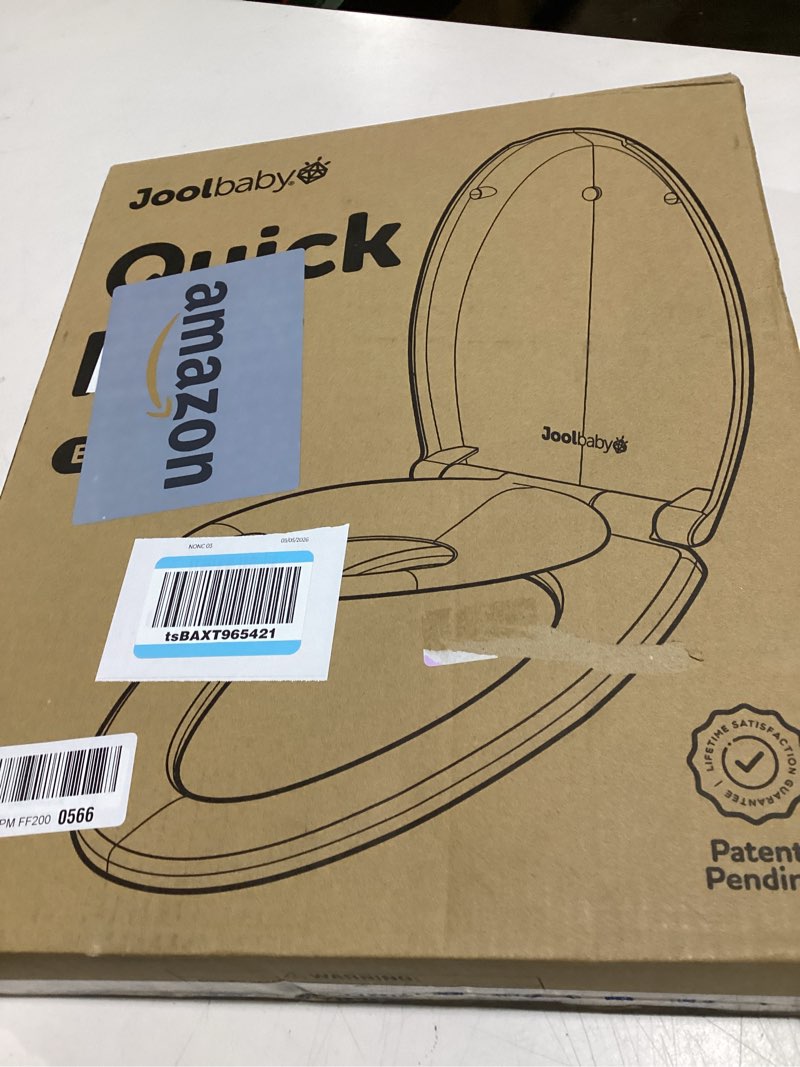 Condition photo showing New/Like New for quick flip toilet seat with built-in potty & splash guard for toddler training, slow close - jool baby (elongated)