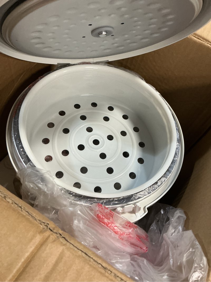 Condition photo showing Good Condition for toshiba rice cooker & steamer simple 5.5 cup(uncooked) with steaming basket, removable non-stick inner pot & inner lid, for soups, stews, grains&oatmeal, one touch&keep warm function, silvery white simple_5.5 cups