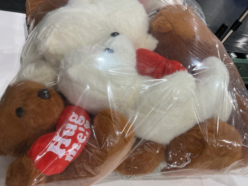Condition photo showing Good Condition for ,ultiple Hug me plush bears white and brown 