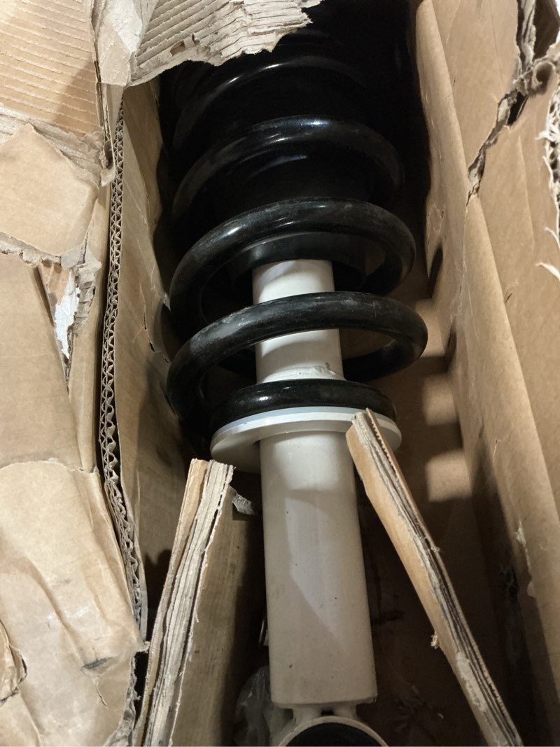 Condition photo showing As Is for rancho rs5000x loaded rs551830 suspension strut and coil spring assembly