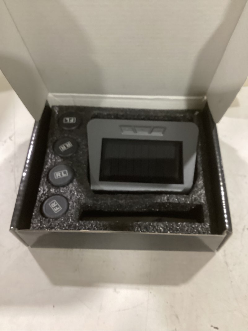 Condition photo showing As Is for RV Tire Pressure Monitoring System (TPMS) - TPMS sensors Set of 4 & 6 Alarm Modes | Solar/USB Charger | LCD Display | for RV/Truck/SUV/MPV/Sedan 4 Sensors