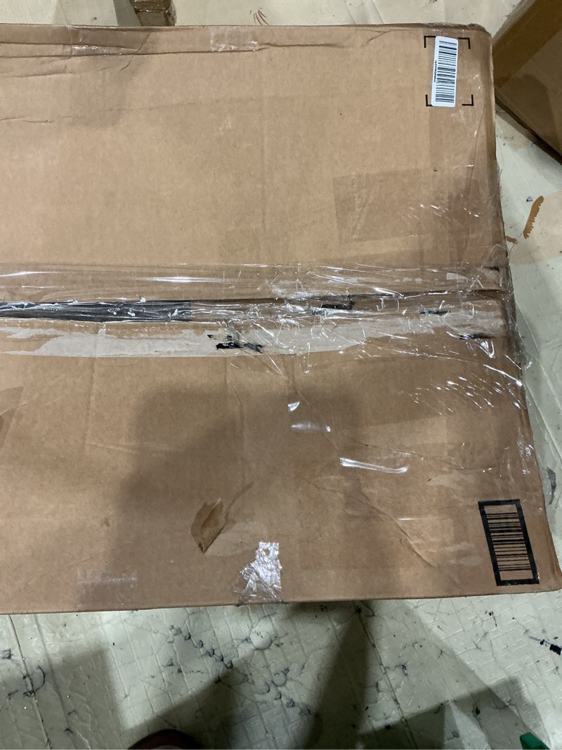 Condition photo showing As Is for  large roll of grey carpet cushion