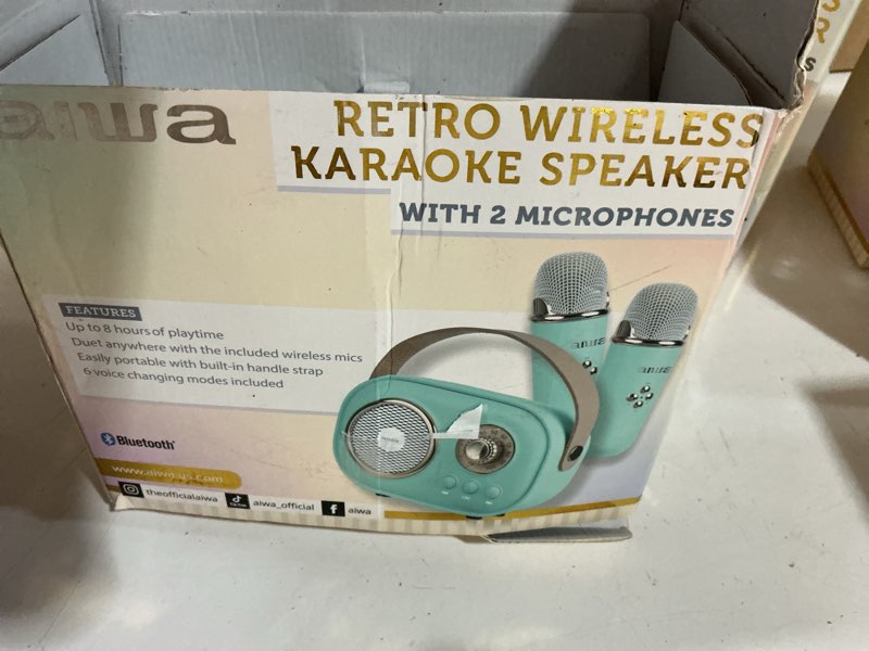 Condition photo showing As Is for aiwa retro bluetooth karaoke speaker with 2 wireless microphones, 8 hours playtime & 6 voice effects