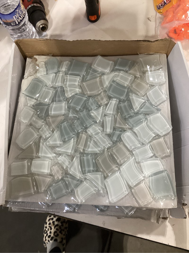 Condition photo showing As Is for 100+ bought last week Elida Ceramica Island Spa 12-in x 12-in Glossy Glass Pebble Mosaic Floor and Wall Tile ( 0.936-sq