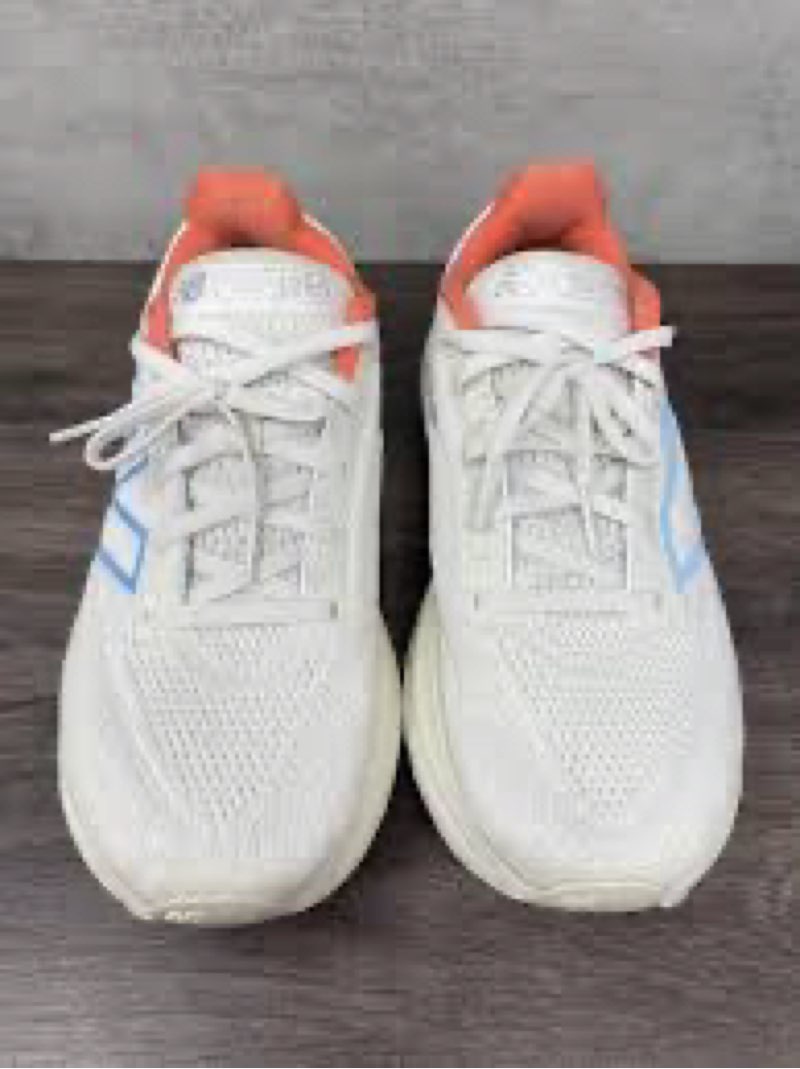 new balance women's fresh foam x 1080 v13 running shoes in the 'sea salt / coastal blue / gulf red' colorway. 