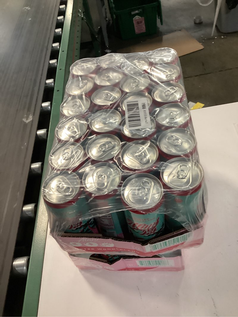 Condition photo showing New/Like New for alani nu winter wonderland, sugar free, low calorie energy drinks, 200mg caffeine, biotin, b vitamins, zero sugar, 10 calories, 12 fl oz cans, 24 pack