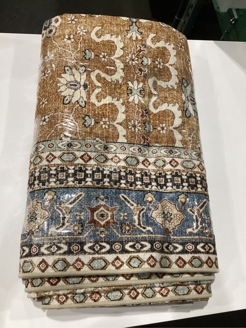 large carpet ( brand & size unknown ) 
