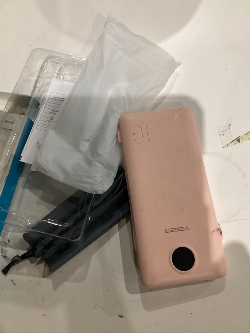 Condition photo showing As Is for VEGER Portable Charger with Built-in AC Plug and Cables, All in One 10000mAh Ultra Slim Power Bank Travel Essentials, Fast Charging Battery Pack Compatible with iPhone, Samsung, Android (Crepe)