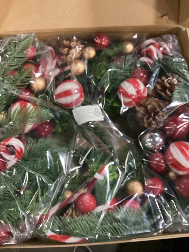 Condition photo showing New/Like New for WDS WONDROUS 24 Inch Artificial Christmas Wreath for Front Door Decor, Xmas Wreath Candy Canes, Christmas Ornaments, Pine Needles, and Red Berries for Door Wall Windows Outdoor Decor