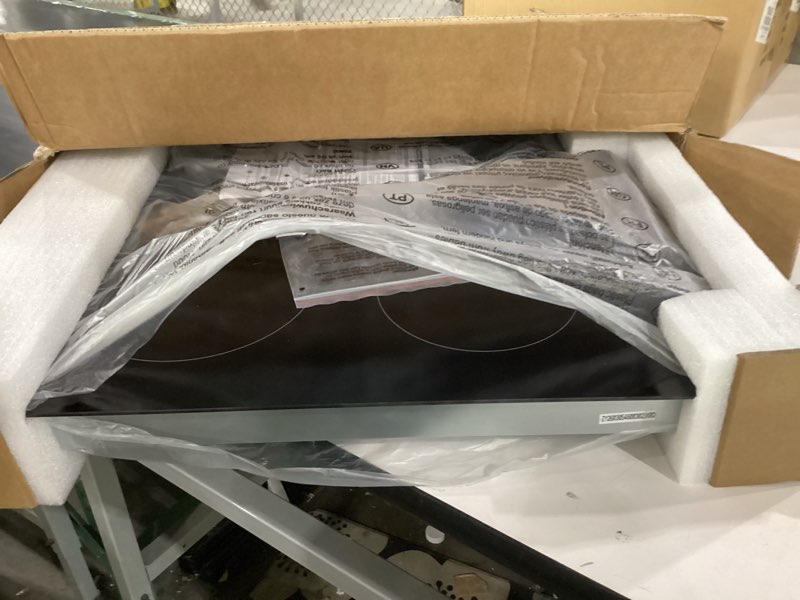 Condition photo showing Good Condition for not tested**** karinear 4 burner electric cooktop 24 inch, built-in stove top, 220-240v radiant cooktop with knob control, residual heat indicator, over-temperature protection, hard wire(no plug)