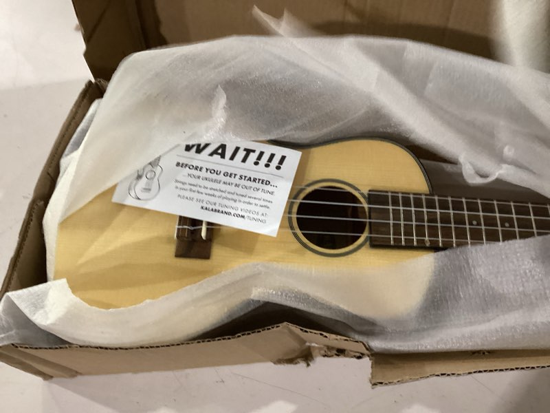 Condition photo showing New/Like New for kala ka-scg solid spruce top gloss concert ukulele, natural