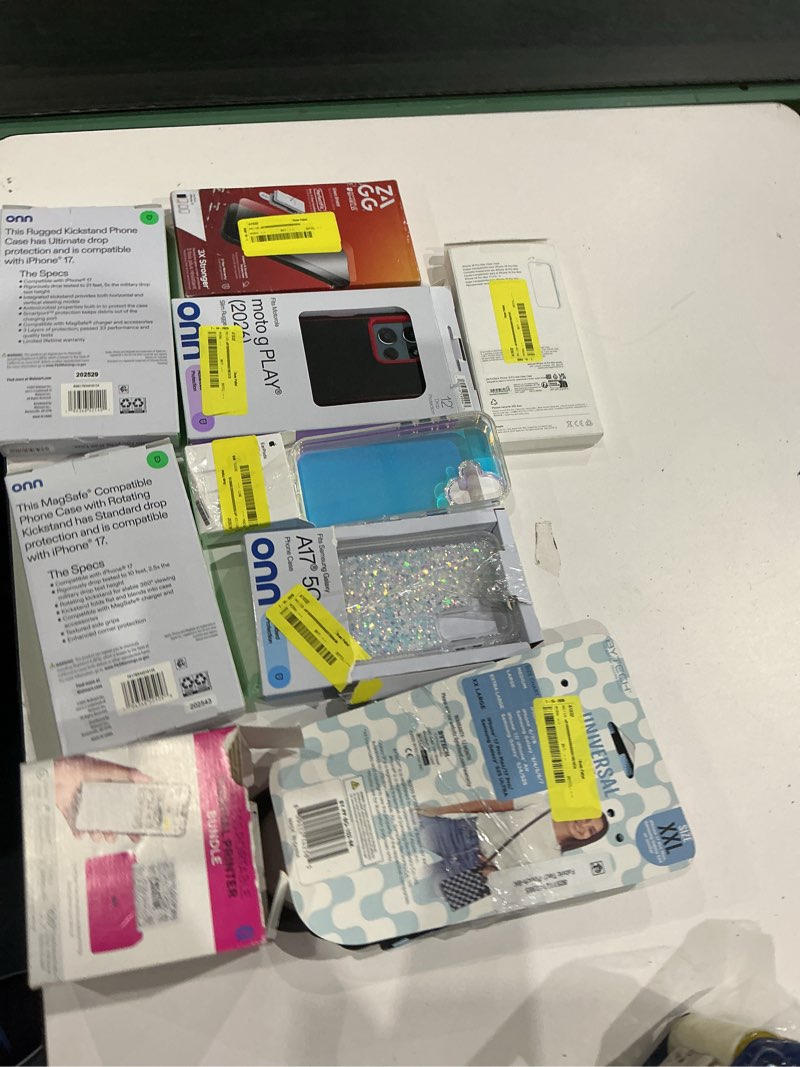 Condition photo showing As Is for assorted cellphone/tablet/laptop case covers & accessories