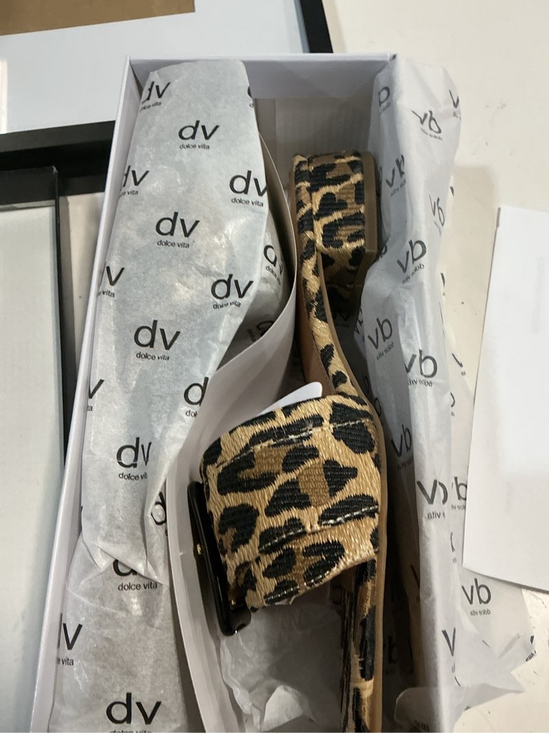 Condition photo showing New/Like New for size 11. dv dolce vita women's neeva buckle slide low block heel dress sandals - leopard