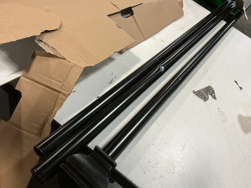 Condition photo showing As Is for allen + roth 72-in to 144-in dark bronze steel single curtain rod