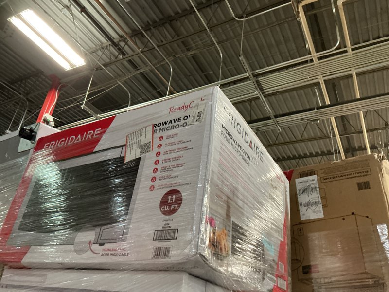 Condition photo showing As Is for Frigidaire, 1.1 Cu. Ft. Microwave