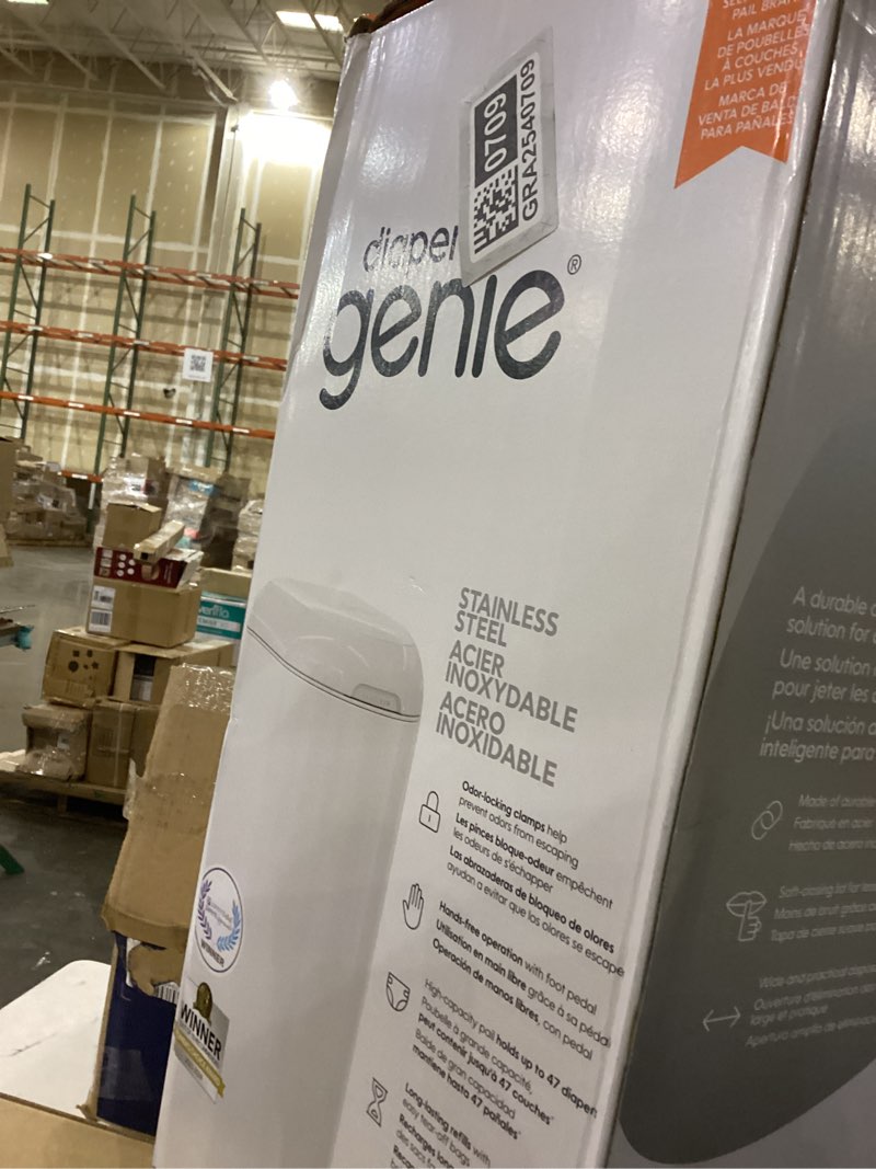 Condition photo showing New/Like New for Diaper Genie Platinum Pail (Lilly White) is Made of Durable Stainless Steel and Includes 1 Easy Roll Refill with 18 Bags That can Last up to 5 Months.