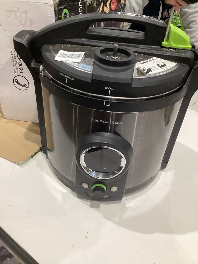 Condition photo showing As Is for 12 qt stainless steel electric pressure canner