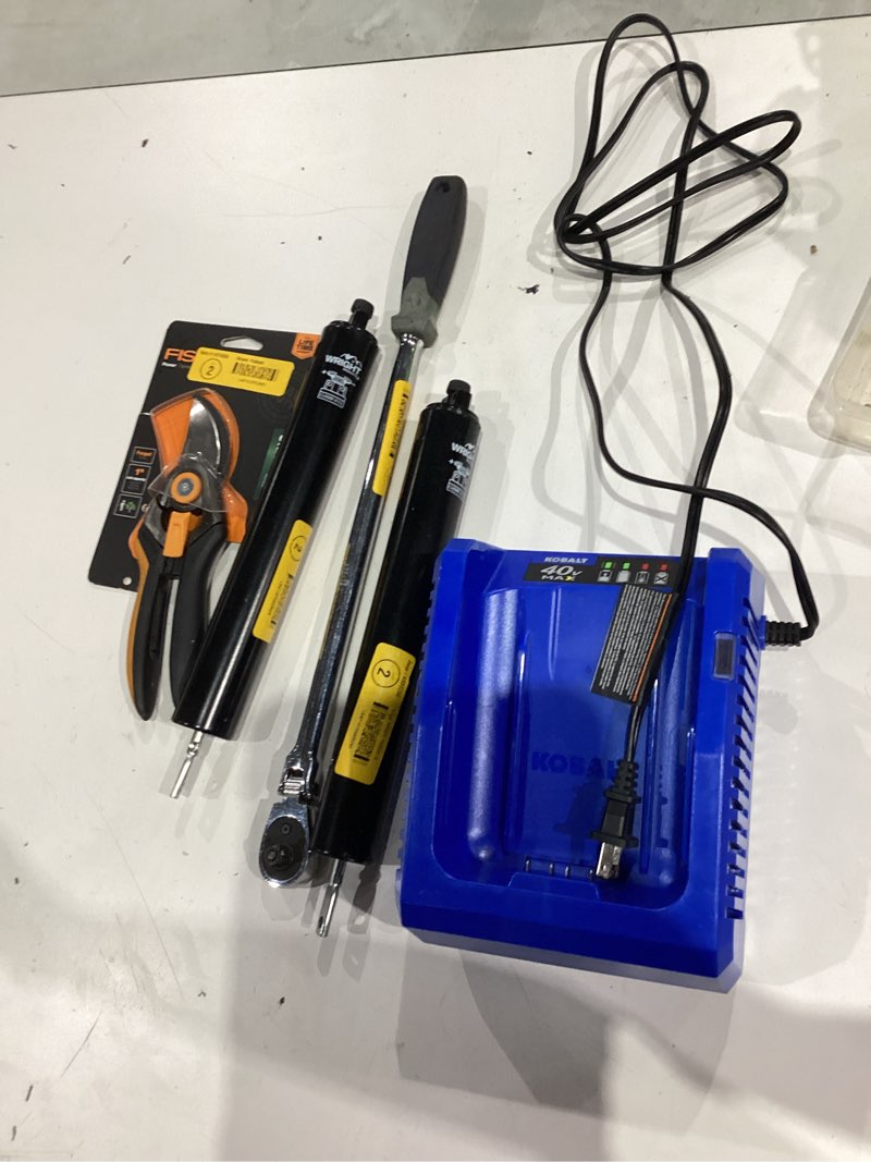 Condition photo showing As Is for assorted home improvement lot (small tools, screw, home accessories, etc.)