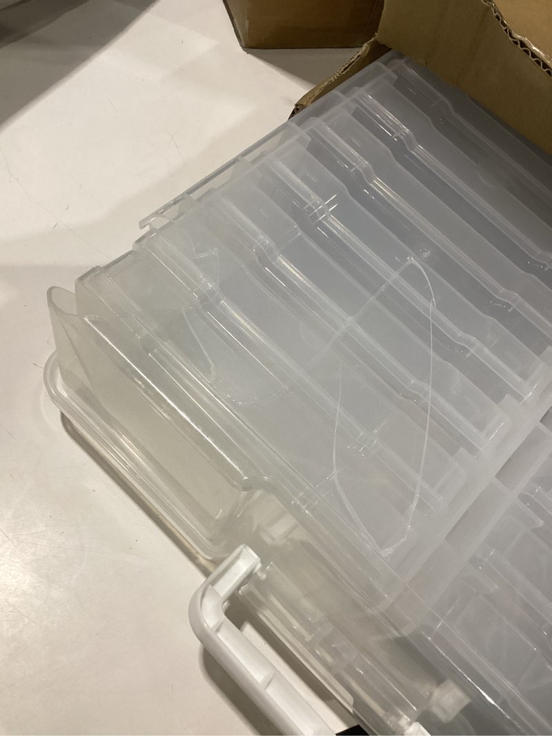 Condition photo showing As Is for novelinks transparent 4\" x 6\" photo organizers and photo storage box with handle, 16 inner photo cases, portable picture organizers & photo storage containers (clear) clear clear, damaged