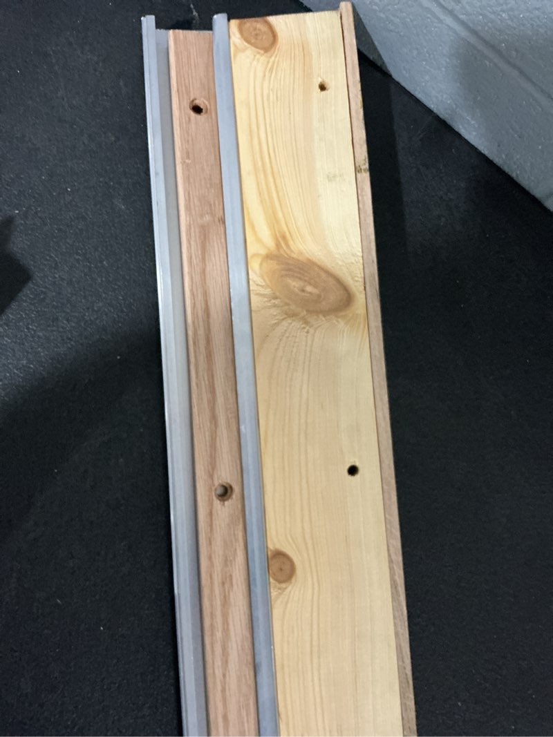 Condition photo showing As Is for m-d building products 1.13 in. h x 5.63 in. w x 36 in. l aluminum adjustable threshold oak