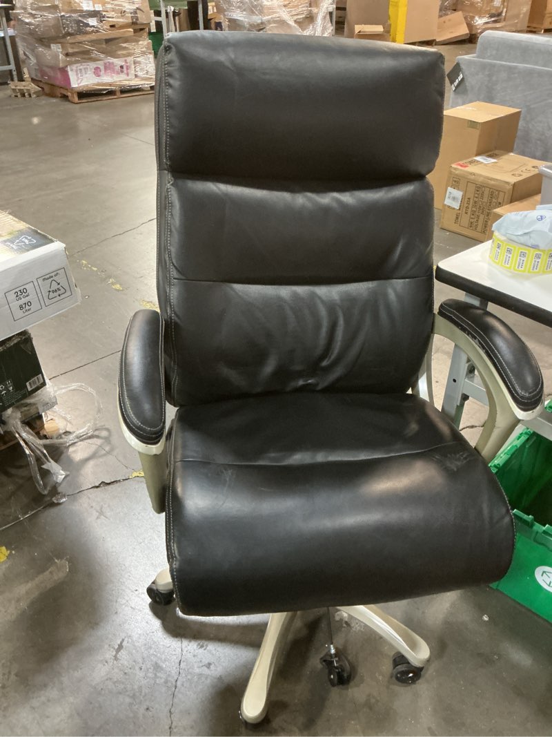 Condition photo showing As Is for lorell executive bonded black leather high-back chair