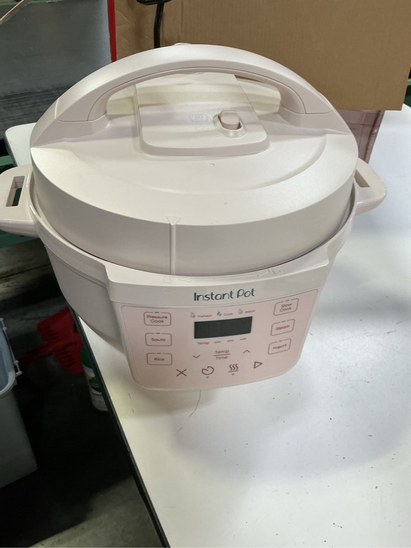 Condition photo showing Good Condition for Instant Pot 4QT RIO Mini 7-in-1 Multi-Cooker, Pressure Cooker, Slow cook, Sauté, Steam, Rice Maker, Yogurt, & Warmer, Rosewater, 4 Quarts Rosewater 4 Quarts