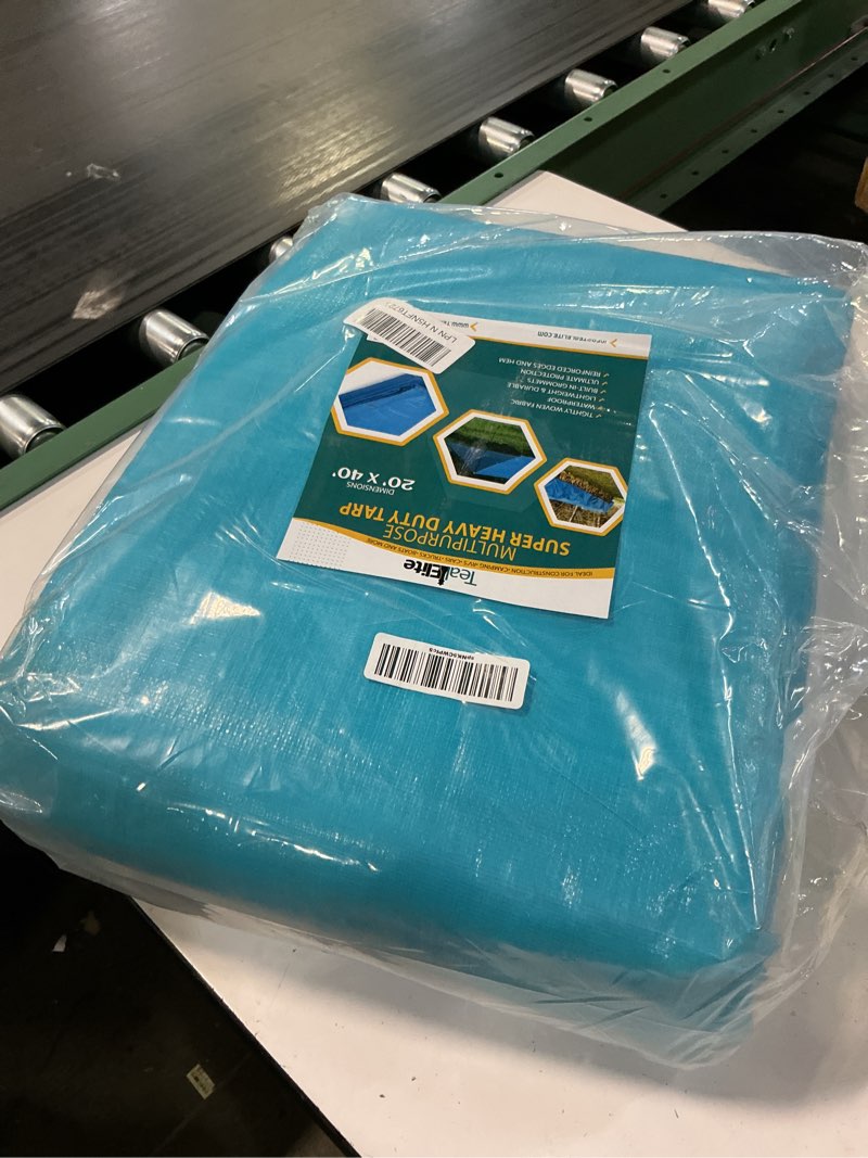 Condition photo showing Good Condition for tarps heavy duty waterproof 20x40-12 mil thick camping tent - blue tarp 20x40 uv resistant, rip & tear proof with metal grommets – multipurpose use for camping, tent, boat, rv, car, & pool cover 20'x40'