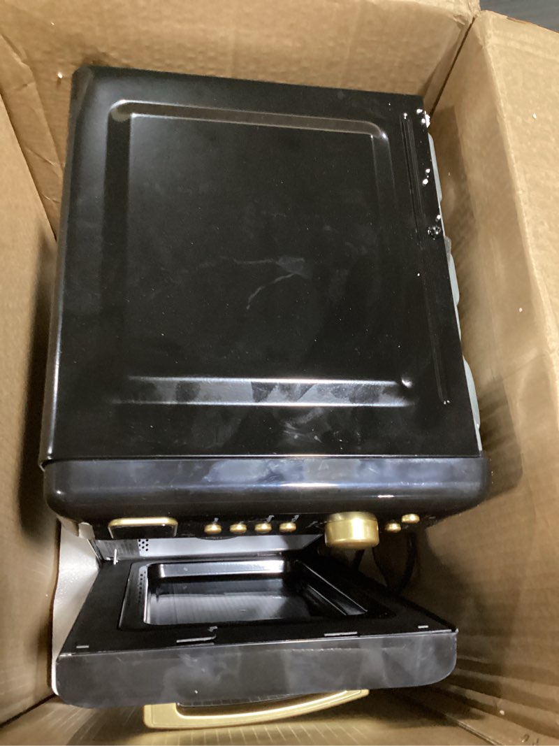 Condition photo showing As Is for frigidaire emw788retro 0.7 cu. ft. retro microwave, black-gold retro black