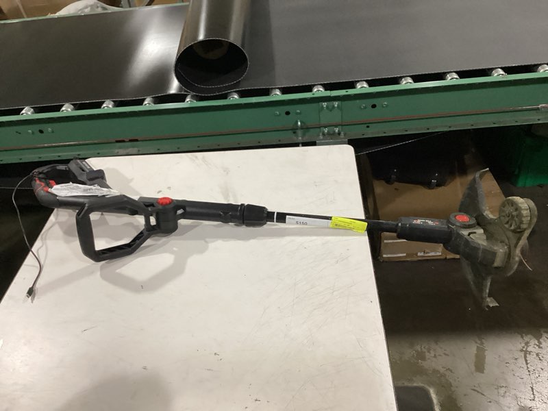 Condition photo showing As Is for hyper tough 12" 20v brushless cordless string trimmer with 20v max 2.0ah battery and charging cable