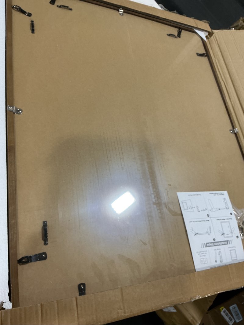 Condition photo showing Good Condition for 24×30 Solid Walnut Wood Picture Frame, HD Glass, Double Mat for 16×20 Or 18×24 Photos, Premium Walnut Photo Frame, Vertical or Horizontal Wall Hanging or Leaning Display