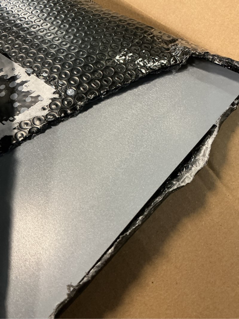 Condition photo showing As Is for DARENYI Acrylic Mirror Sheet for Wall, 15.7" x 19.6" Large Rectangular Mirror Tiles Frameless Wall Mounted Mirror Self-Adhesive Mirror Stickers for Vanity Bedroom Home Decor 15.7"L x 19.6"W